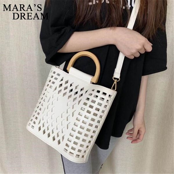 women bags handbags 2020 famous brands hollow out beach bag bolsa feminina wood handle tote bags pu leather shoulder bag purses
women bags handbags 2020 famous brands hollow out beach bag bolsa feminina wood handle tote bags pu leather shoulder bag purses