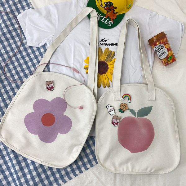 japanese student harajuku ins wind flower shoulder canvas bag large capacity female 2020 new fashion art peach messenger bag
japanese student harajuku ins wind flower shoulder canvas bag large capacity female 2020 new fashion art peach messenger bag