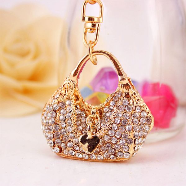 xdpqq fashion cute crystal handbag shape key chain female bag accessories metal pendant key chain small gift, Silver
xdpqq fashion cute crystal handbag shape key chain female bag accessories metal pendant key chain small gift, Silver