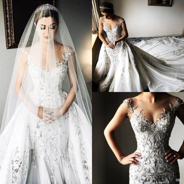 luxurious crystals 2019 arabic wedding dresses off the shoulder beads mermaid bridal dresses detachable train vintage tulle wedding gowns, White
luxurious crystals 2019 arabic wedding dresses off the shoulder beads mermaid bridal dresses detachable train vintage tulle wedding gowns, White