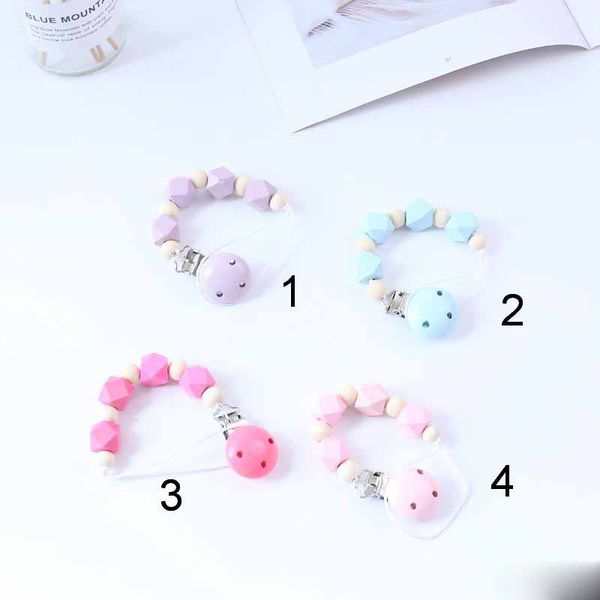 2020 pacifier clip chain baby infant silicone wooden teething beads paci holder soothie clips teether toy chew beads
2020 pacifier clip chain baby infant silicone wooden teething beads paci holder soothie clips teether toy chew beads