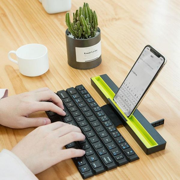 1pcs with holder wireless bluetooth keyboard universal roll-up quick response for lapsmartphone
1pcs with holder wireless bluetooth keyboard universal roll-up quick response for lapsmartphone