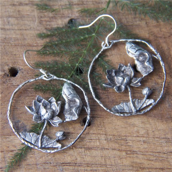 guizhou national wind seedlings silver round lotus high-grade earrings retro style fashion personality earrings female temperament super fai 
guizhou national wind seedlings silver round lotus high-grade earrings retro style fashion personality earrings female temperament super fai