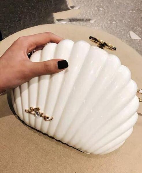 elegant ivory pearl shell wristband bag brand clutch wallet designer chain shoulder bag luxury vip gift purse black pearl shell handbag
elegant ivory pearl shell wristband bag brand clutch wallet designer chain shoulder bag luxury vip gift purse black pearl shell handbag
