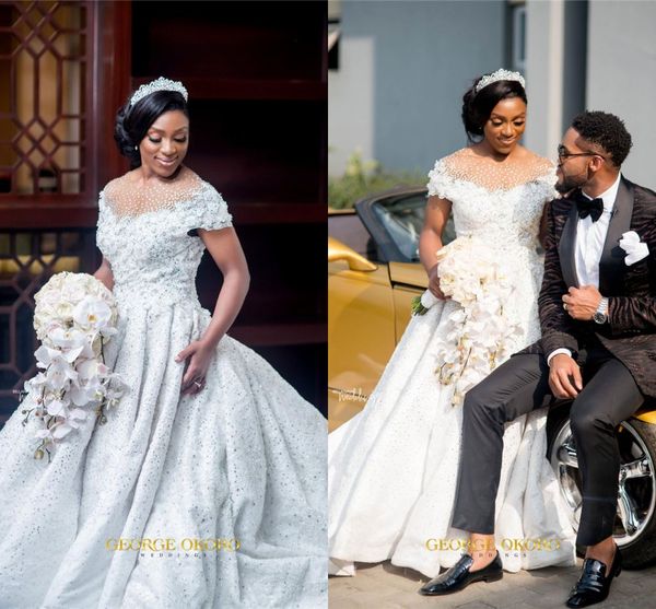 luxury crystal beaded afrcan a-line plus size wedding dress 2020 vintage 3d lace flower cap sleeves black dubai bridal gown, White
luxury crystal beaded afrcan a-line plus size wedding dress 2020 vintage 3d lace flower cap sleeves black dubai bridal gown, White