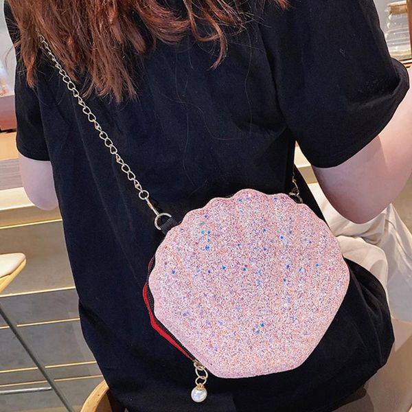 women shopping metal chain handbags bling sequins zipper closure fashion shoulder messenger casual crossbody bag shell shaped
women shopping metal chain handbags bling sequins zipper closure fashion shoulder messenger casual crossbody bag shell shaped