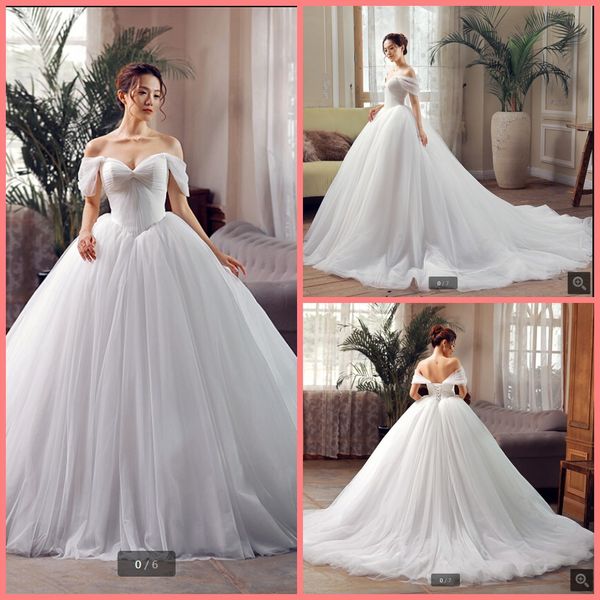 2020 real picture white tulle ball gown wedding dress off the shoulder sweetheart neck pleated puffy bride dress selling wedding dress 
2020 real picture white tulle ball gown wedding dress off the shoulder sweetheart neck pleated puffy bride dress selling wedding dress