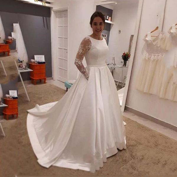 custom made wedding dresses 2020 long sleeves lace appliques with pockets scoop neck court train satin wedding bridal gowns q29, White
custom made wedding dresses 2020 long sleeves lace appliques with pockets scoop neck court train satin wedding bridal gowns q29, White