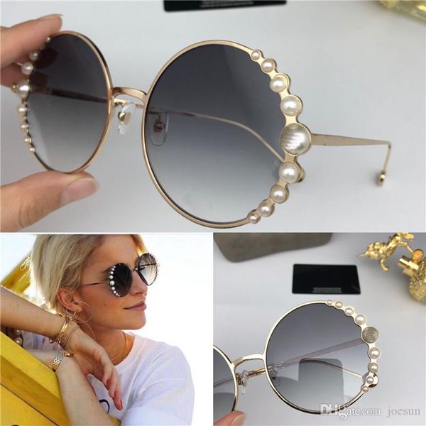 new fashion designer women 0288sunglasses round metal frame with luxurious pearl avant-garde pop style uv 400 protective eyewear, White;black
new fashion designer women 0288sunglasses round metal frame with luxurious pearl avant-garde pop style uv 400 protective eyewear, White;black