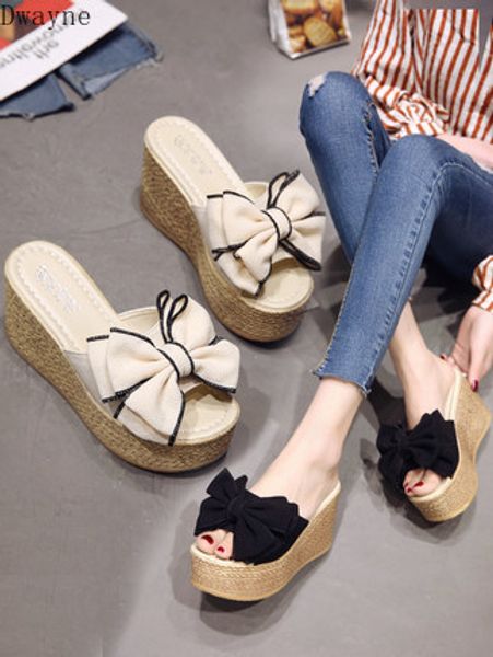 wedge slipper female 2020 new wild thick bottom increased super fire fashion women's shoes drag, Black
wedge slipper female 2020 new wild thick bottom increased super fire fashion women's shoes drag, Black
