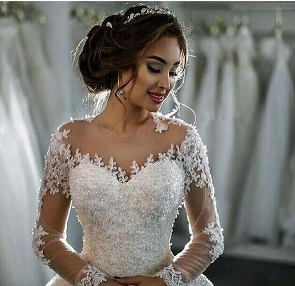 sellingnew dubai elegant long sleeves a-line wedding dresses sheer crew neck lace appliques beaded vestios de novia bridal gowns with, Black;gray
sellingnew dubai elegant long sleeves a-line wedding dresses sheer crew neck lace appliques beaded vestios de novia bridal gowns with, Black;gray