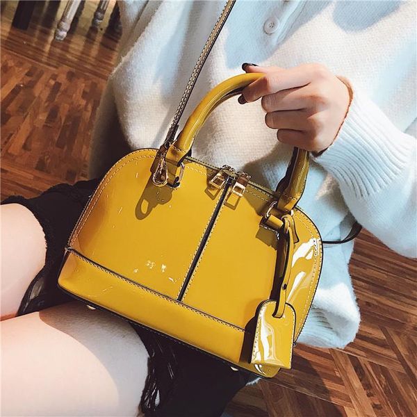 women's designer handbag 2019 new high-quality pu leather women tote bag patent leather shell bag simple stitching shoulder bag
women's designer handbag 2019 new high-quality pu leather women tote bag patent leather shell bag simple stitching shoulder bag