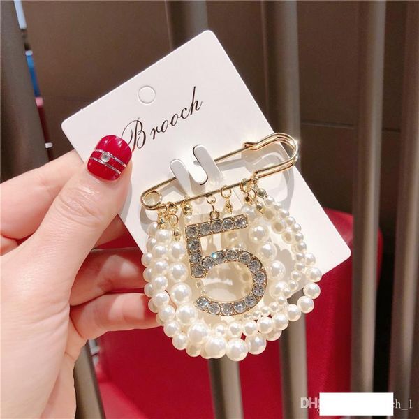 new party number 5 luxury brooch pearl rhinestone brand designer suit lapel pin with chain pearls women famous brand jewelry accessories, Gray
new party number 5 luxury brooch pearl rhinestone brand designer suit lapel pin with chain pearls women famous brand jewelry accessories, Gray