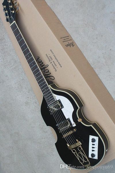 black unusual shape electric guitar and shield white pearl, rosewood scale, white requirements, precision production, providin
black unusual shape electric guitar and shield white pearl, rosewood scale, white requirements, precision production, providin