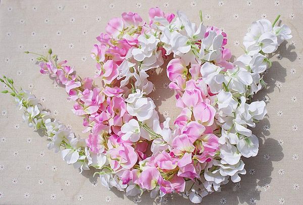 long elegant white artificial fake flowers wisteria silk flower wall vine for home party wedding decorations garden floral decoration
long elegant white artificial fake flowers wisteria silk flower wall vine for home party wedding decorations garden floral decoration