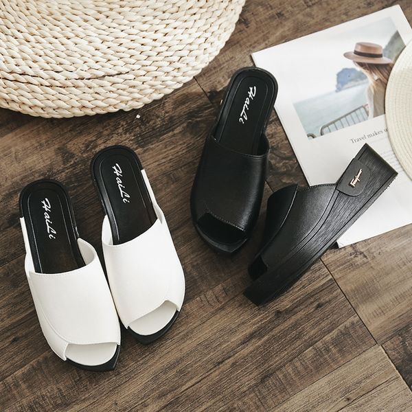 artificial leather casual sandals women's thick bottomed black and white casual shoes women's round-toe extra high slanted heel
artificial leather casual sandals women's thick bottomed black and white casual shoes women's round-toe extra high slanted heel