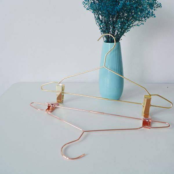 nordic style rose gold metal pants hangers with clips clothes skirt display rack for clothing store wardrobe organizer
nordic style rose gold metal pants hangers with clips clothes skirt display rack for clothing store wardrobe organizer