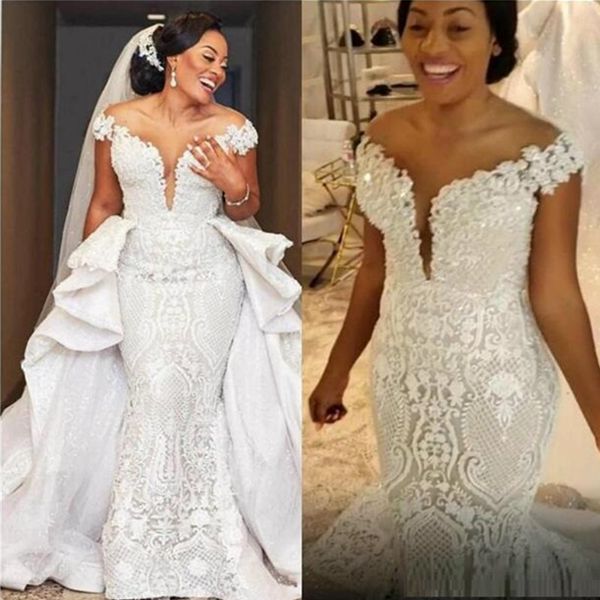 spark mermaid wedding dresses with detachable train african lace country garden boho bridal gowns off the shoulder detachable train dress, White
spark mermaid wedding dresses with detachable train african lace country garden boho bridal gowns off the shoulder detachable train dress, White