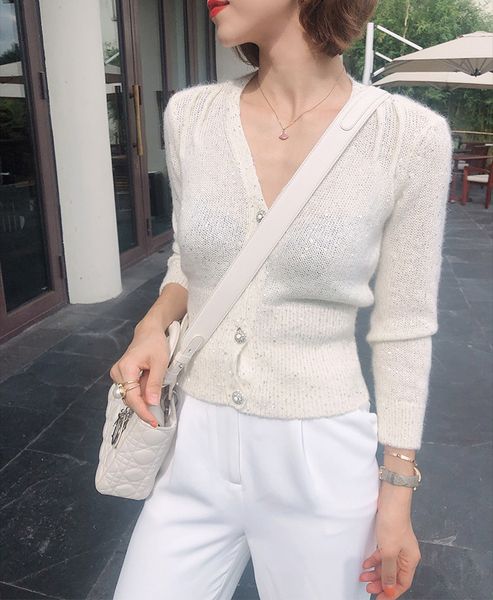 women long sleeve v neck slim fit white or grey cardigan sweater with button closure - latest fashion knitted jumper
women long sleeve v neck slim fit white or grey cardigan sweater with button closure - latest fashion knitted jumper
