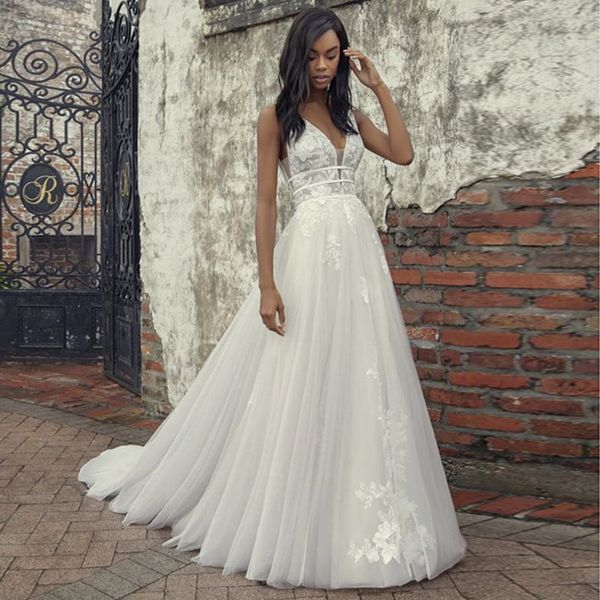 stunning lace appliqued beach wedding dresses deep v neck a line bohemian bridal gowns sweep train tulle robe de mariée, White
stunning lace appliqued beach wedding dresses deep v neck a line bohemian bridal gowns sweep train tulle robe de mariée, White