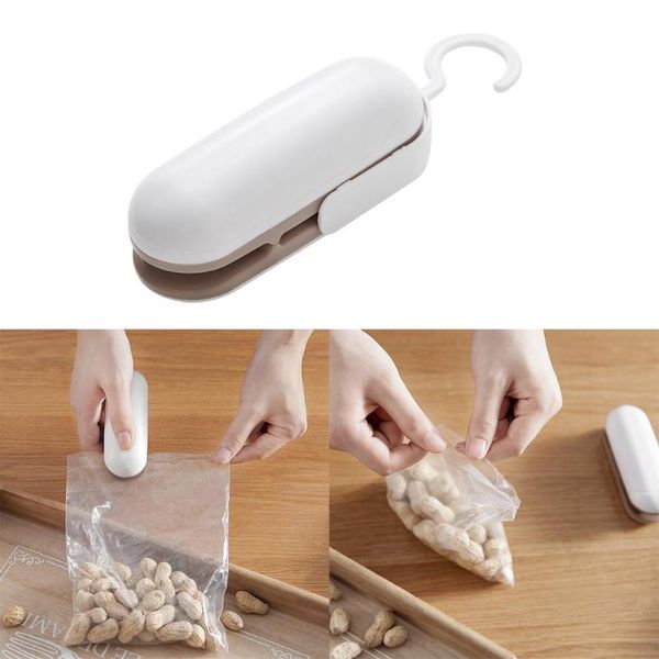 mini handy automatic heater package sealer clamps heat sealing food sealer film bags packing machine for household appliances
mini handy automatic heater package sealer clamps heat sealing food sealer film bags packing machine for household appliances