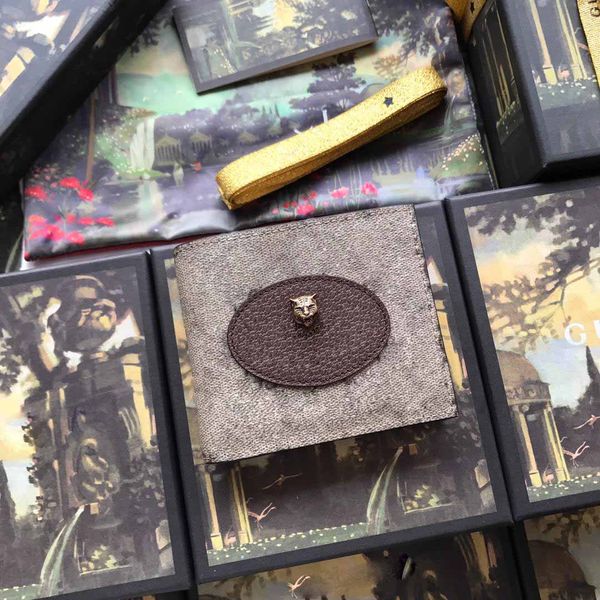 real leather tiger style wallets for me card holders credit card bus card wallets for women with serial number box 473954, Brown;gray 
real leather tiger style wallets for me card holders credit card bus card wallets for women with serial number box 473954, Brown;gray