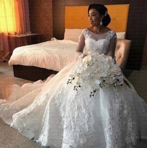 luxury african wedding dresses sheer crew neck long sleeves scoop lace appliques beaded arabic bridal gowns 2019 new fashion custom made, White 
luxury african wedding dresses sheer crew neck long sleeves scoop lace appliques beaded arabic bridal gowns 2019 new fashion custom made, White