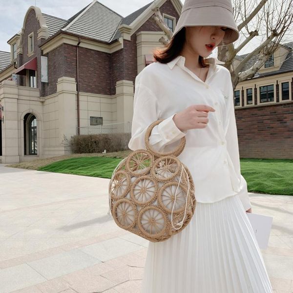 female round hollow beach holiday tote handmade straw women shoulder bag handbag casual handbags retro mini shoulder bag
female round hollow beach holiday tote handmade straw women shoulder bag handbag casual handbags retro mini shoulder bag