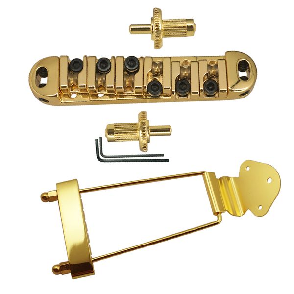 golden zinc alloy roller saddle bridge tailpiece, small lock studs, hex wrenches set for gibson les paul lp electric guitar
golden zinc alloy roller saddle bridge tailpiece, small lock studs, hex wrenches set for gibson les paul lp electric guitar