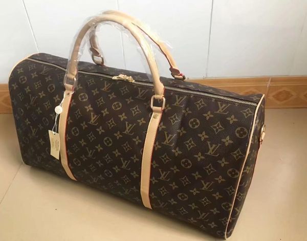 2020 men duffle bag women travel bags hand luggage luxury designer travel bag men pu leather handbags large cross body bag totes 54cm
2020 men duffle bag women travel bags hand luggage luxury designer travel bag men pu leather handbags large cross body bag totes 54cm