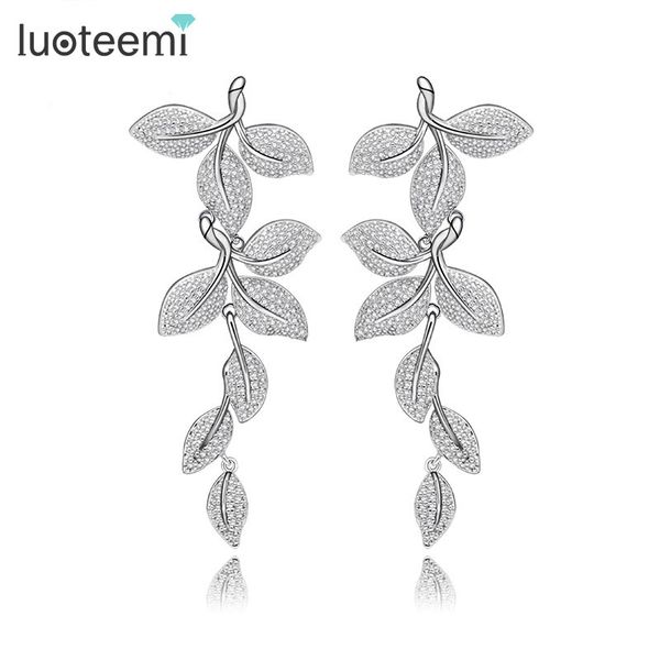 luoteemi 2016 новый элегантный форма листа серьги падения себе крошка cz белого цвета благородный люкс свадебные мотаться brincos ювелирные, Silver
luoteemi 2016 новый элегантный форма листа серьги падения себе крошка cz белого цвета благородный люкс свадебные мотаться brincos ювелирные, Silver