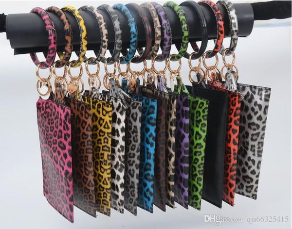 2020 new fashion pu leather o bracelet keychains hang change purse phone bag tassel wristlet keychain for women girls gift, Black
2020 new fashion pu leather o bracelet keychains hang change purse phone bag tassel wristlet keychain for women girls gift, Black