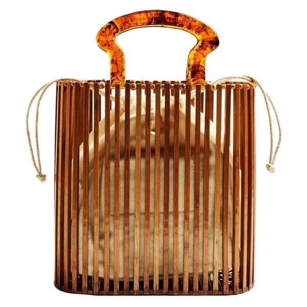 ladies hollow beach bag portable bamboo high-grade ladies bags fashion solid color bucket drawstring bags
ladies hollow beach bag portable bamboo high-grade ladies bags fashion solid color bucket drawstring bags