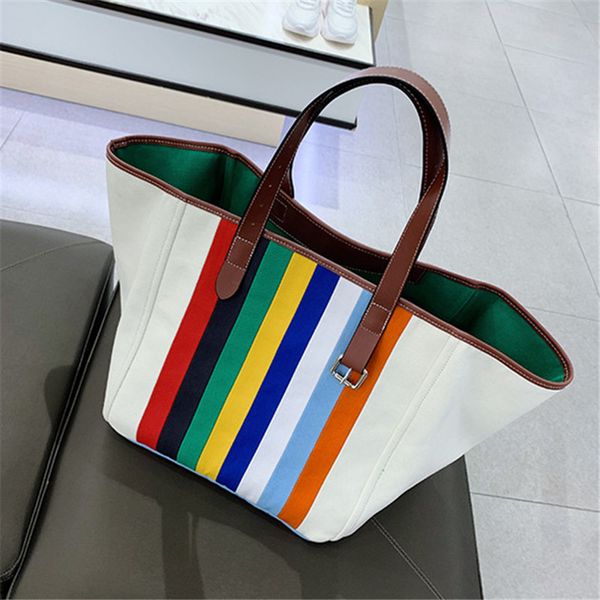 2020 мода атмосфера женский мешок большой емкости радуга stripe canvas темперамент женская сумка wild повседневный плеча tote 
2020 мода атмосфера женский мешок большой емкости радуга stripe canvas темперамент женская сумка wild повседневный плеча tote