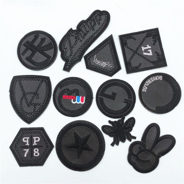 120pcs patches for clothes iron on black pu leather appliques badge military embroidery
120pcs patches for clothes iron on black pu leather appliques badge military embroidery