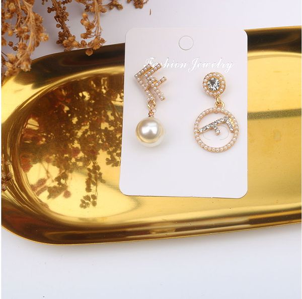 boutique vintage letter wings pearl temperament gold women's charm pendants asymmetric stud earrings fashion jewelry, Golden
boutique vintage letter wings pearl temperament gold women's charm pendants asymmetric stud earrings fashion jewelry, Golden