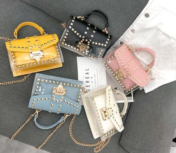 small clear brand designer woman new fashion messenger bag chains shoulder bag female rivets transparent square pu handbag
small clear brand designer woman new fashion messenger bag chains shoulder bag female rivets transparent square pu handbag