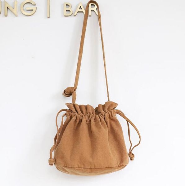 korean version of the wild pumping bucket bag casual simple retro messenger bag cute literary canvas shoulder
korean version of the wild pumping bucket bag casual simple retro messenger bag cute literary canvas shoulder