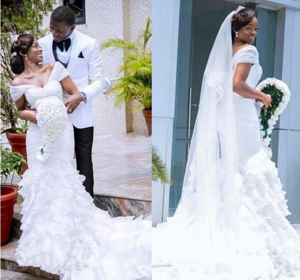 african mermaid wedding dresses v-neck backless tiered organza cathedral train white plus size bridal gowns vestidos de mariee
african mermaid wedding dresses v-neck backless tiered organza cathedral train white plus size bridal gowns vestidos de mariee