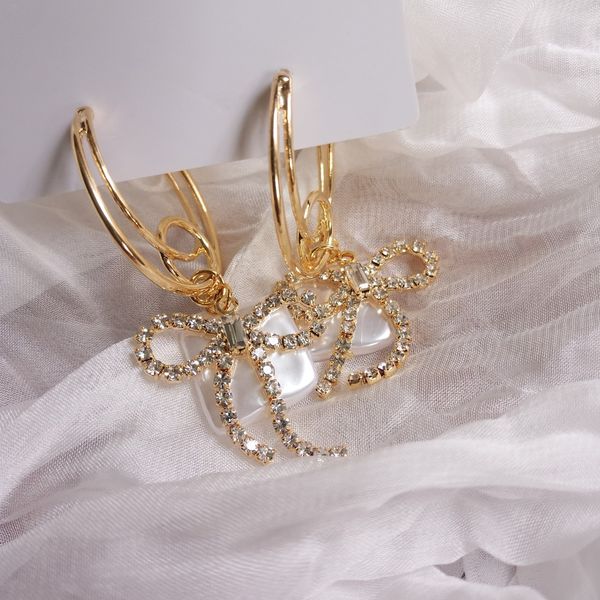 rongho crystal bowknot earring for women brincos square shell earring pendant gold metal bijoux femme, Golden;silver
rongho crystal bowknot earring for women brincos square shell earring pendant gold metal bijoux femme, Golden;silver