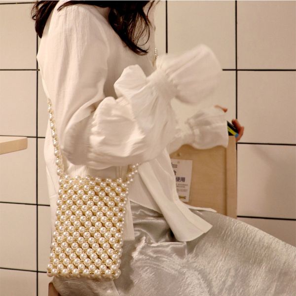 luxury new hand-woven pearl bag beaded women shoulder messenger bag design mini mobile phone evening package bolsa de perlas
luxury new hand-woven pearl bag beaded women shoulder messenger bag design mini mobile phone evening package bolsa de perlas