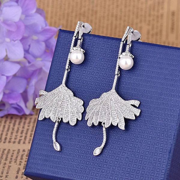 european and american new style luxury pearl zircon exaggerated personality flower shape design silver color earring fashion earring jewelry, Golden
european and american new style luxury pearl zircon exaggerated personality flower shape design silver color earring fashion earring jewelry, Golden
