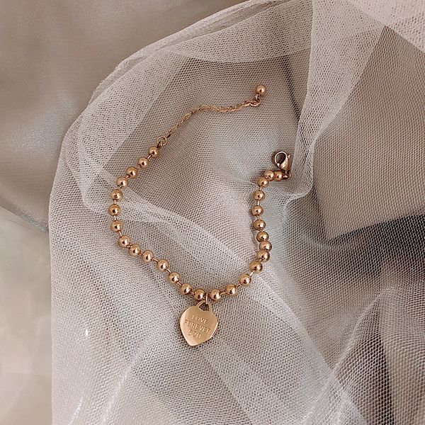 new couple 520 love peach heart engraved pendant titanium steel ball bracelet net red bracelet ornaments wholesale, Golden;silver
new couple 520 love peach heart engraved pendant titanium steel ball bracelet net red bracelet ornaments wholesale, Golden;silver