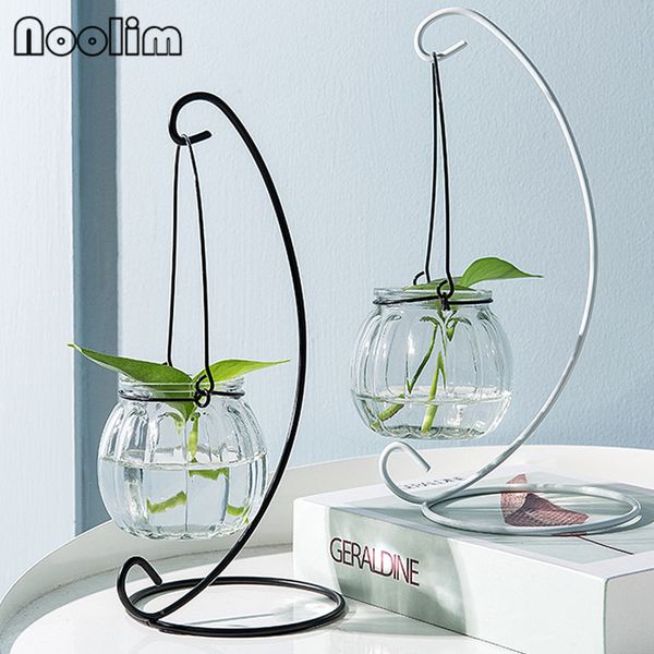 creative hanging transparent hydroponic glass vase with iron frame flower pot green plant wall hanging vase small fish tank
creative hanging transparent hydroponic glass vase with iron frame flower pot green plant wall hanging vase small fish tank