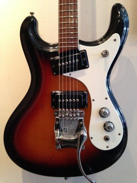 1966 ventures mosrite zero(0) fret jrm johnny ramone sunburst electric guitar tremolo tailpiece, dual black p-90 pickups, cream pickguard
1966 ventures mosrite zero(0) fret jrm johnny ramone sunburst electric guitar tremolo tailpiece, dual black p-90 pickups, cream pickguard