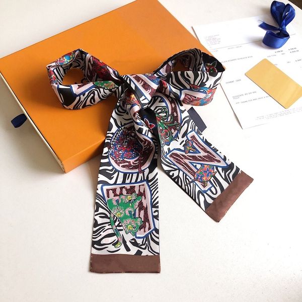 the new 2020 fashion small ribbon double silk scarves luxury small silk scarves size 8*115cm, Blue;gray
the new 2020 fashion small ribbon double silk scarves luxury small silk scarves size 8*115cm, Blue;gray