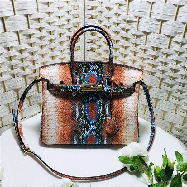 2019 package snake skin spelling color genuine leather woman package atmosphere hand bill of lading shoulder satchel
2019 package snake skin spelling color genuine leather woman package atmosphere hand bill of lading shoulder satchel