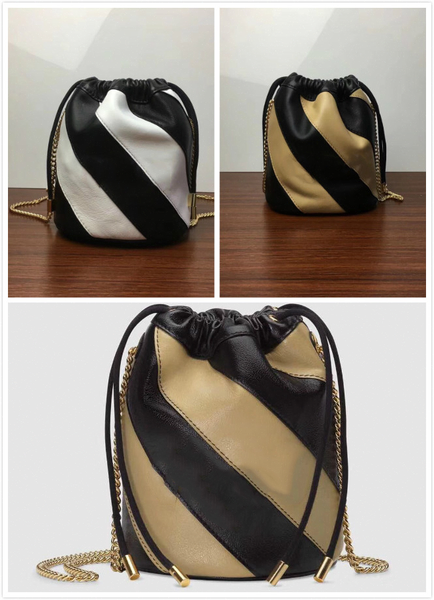 new designer handbag tote shoulder bag female slung bucket decorated with gold silver two tone interlocking style different shades of l33a0#
new designer handbag tote shoulder bag female slung bucket decorated with gold silver two tone interlocking style different shades of l33a0#