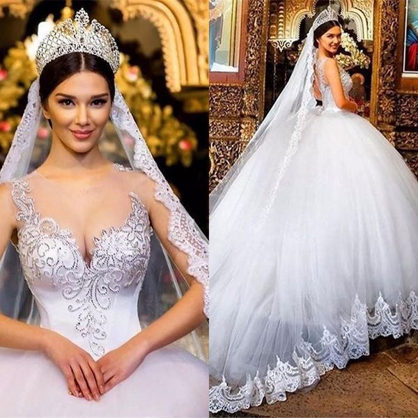 2019 Ball Gown Wedding Dresses Sheer Neckline Lace Applique Beads Crystal Jewel Neck Court Back Plus Size Formal Bridal Gowns
2019 Ball Gown Wedding Dresses Sheer Neckline Lace Applique Beads Crystal Jewel Neck Court Back Plus Size Formal Bridal Gowns