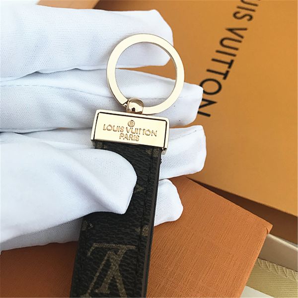 2020 luxury keychain designer key chain real leather with stainless steel keychain keyring in golden with brown with box, Silver
2020 luxury keychain designer key chain real leather with stainless steel keychain keyring in golden with brown with box, Silver